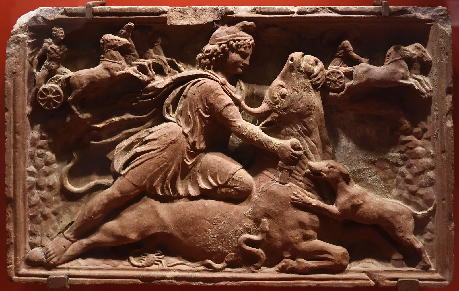 Red marble relief of Mithras slaying a bull