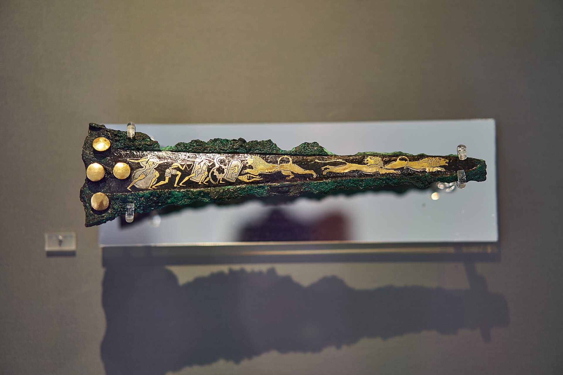 Mycenaean bronze dagger blade with gold and silver lion hunt inlay