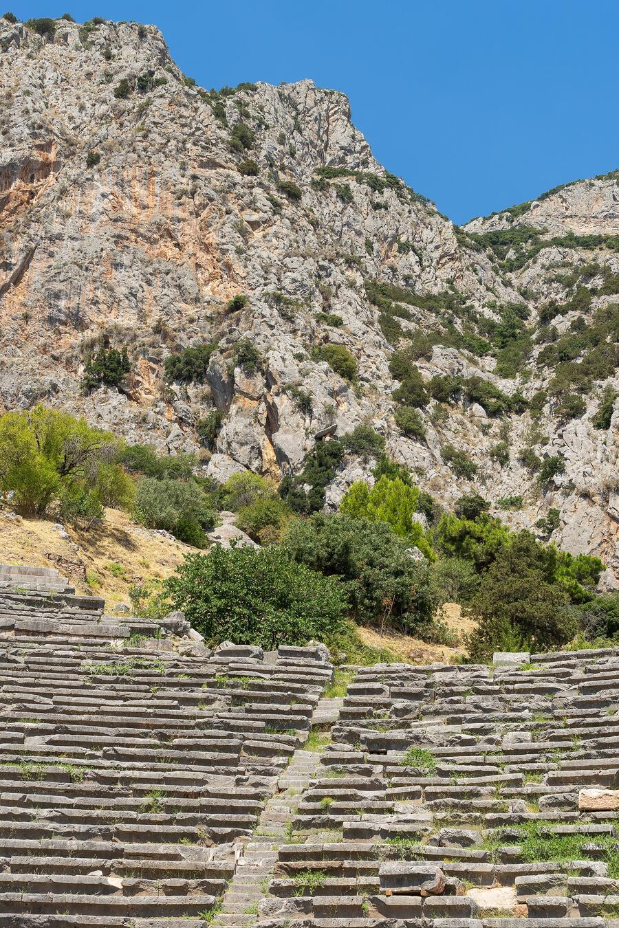 Ancient theatre with mountains behind