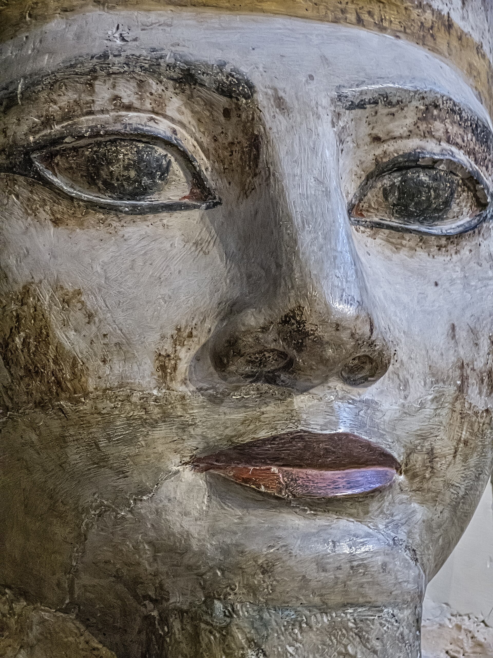Close view of a colossal stone head of Ramesses II