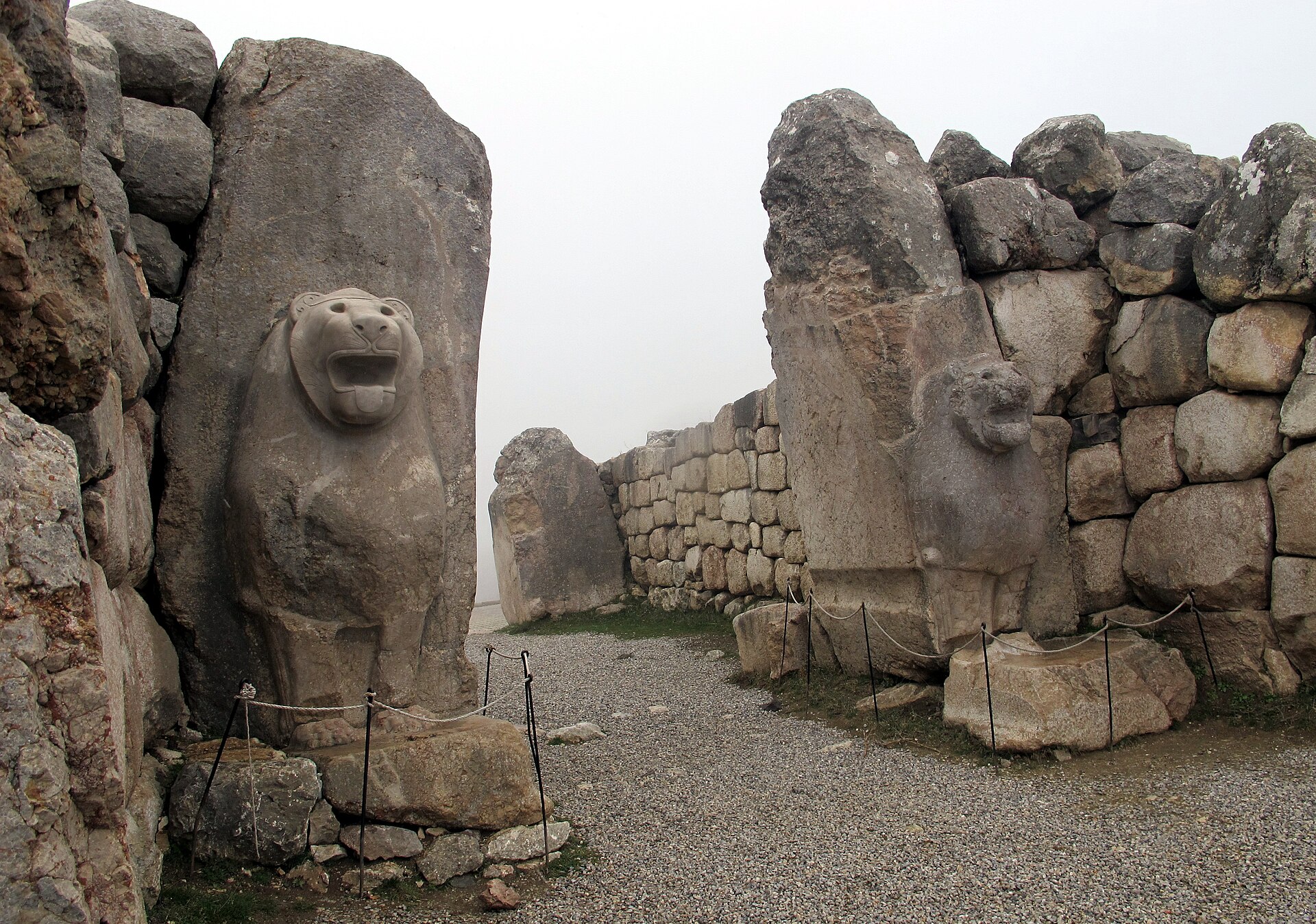 Stone gate flanked by carved lions at Hattusa