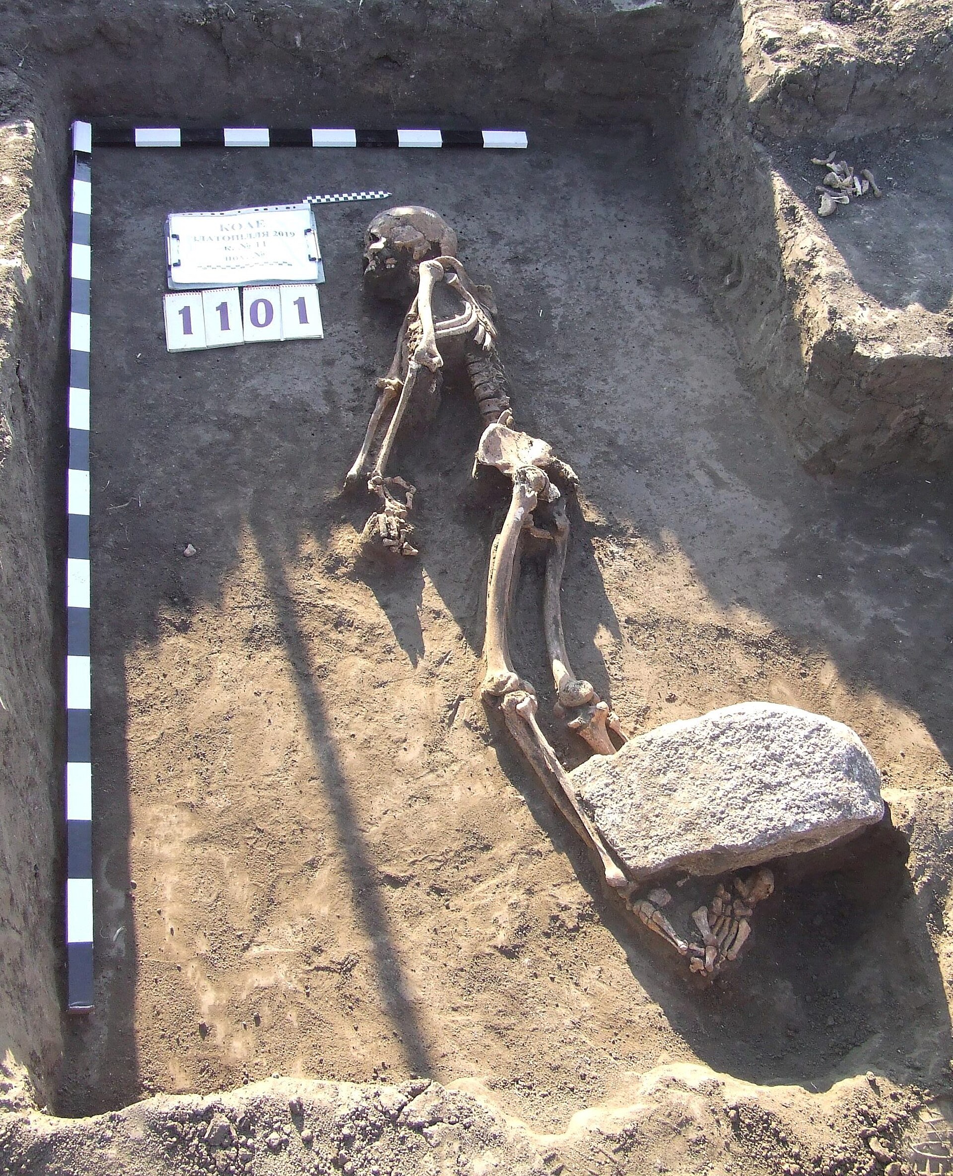 Excavated Bronze Age burial pit in Ukraine