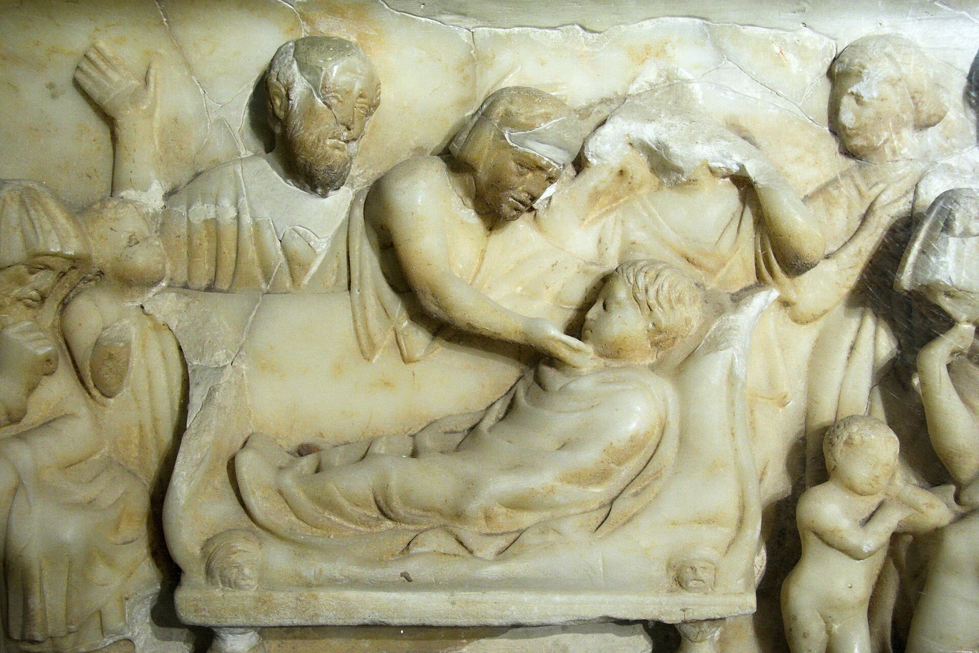 Marble Roman child's sarcophagus carved with mourners