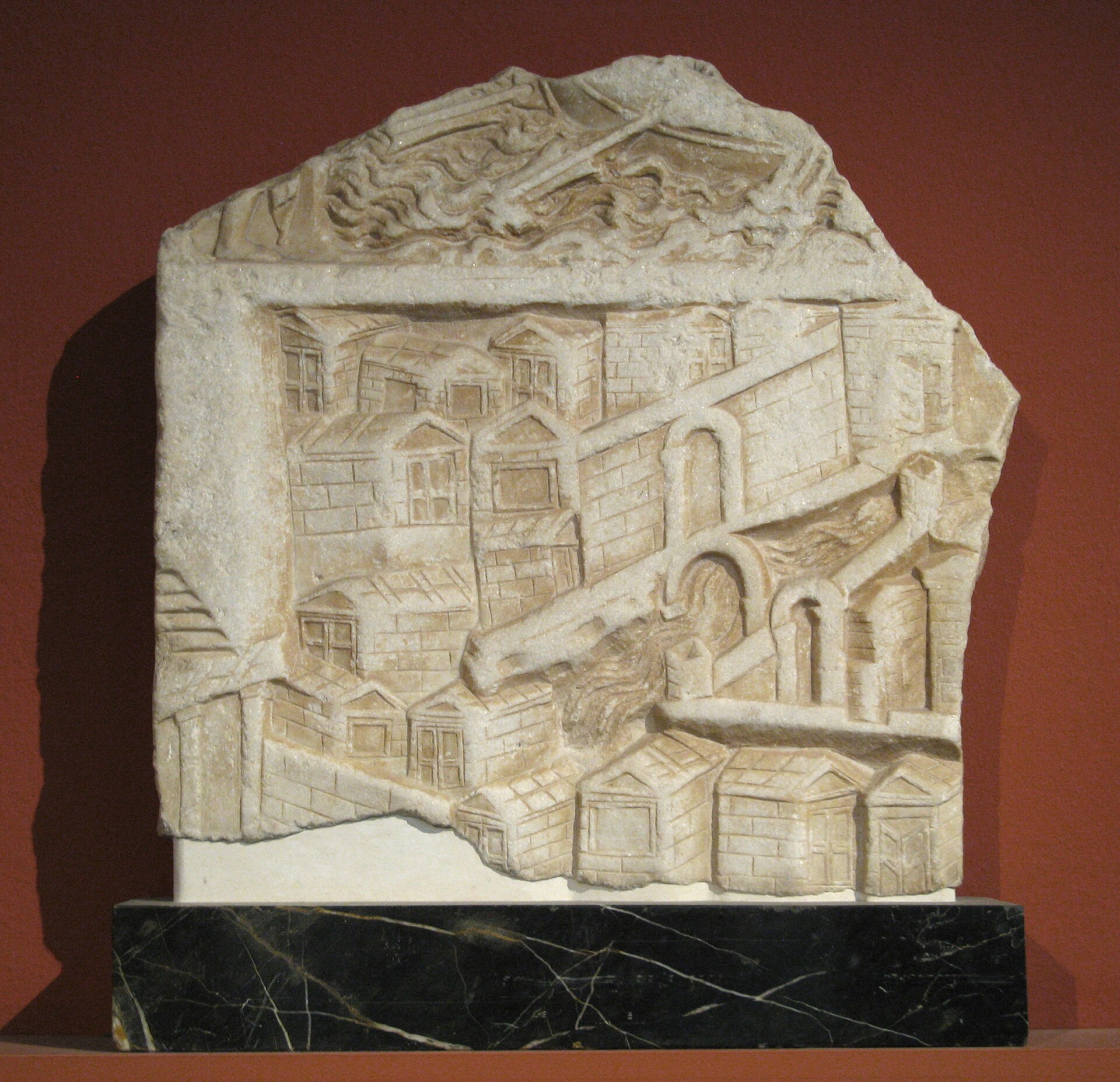 Roman glass urn with two handles and lid