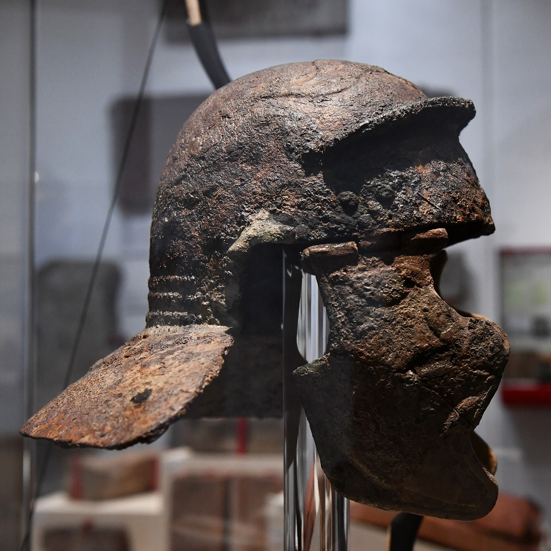 Iron Roman legionary helmet in a museum