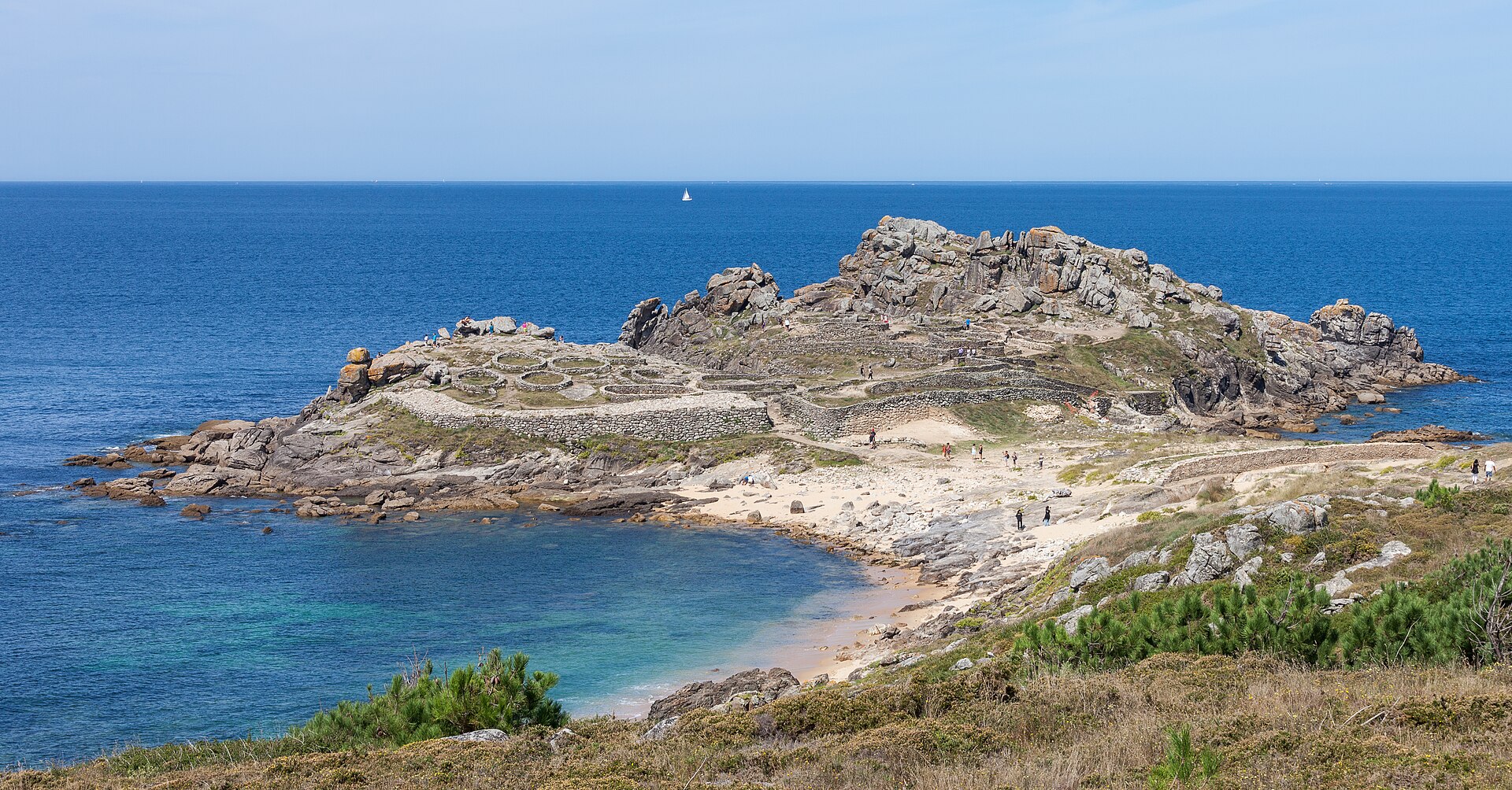 Stone ruins of round houses at Castro de Baroña